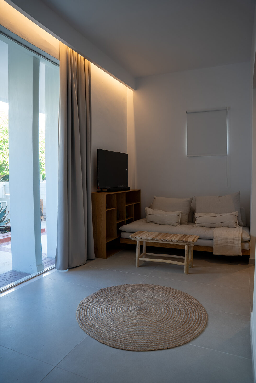 Living area with doors opening to the garden